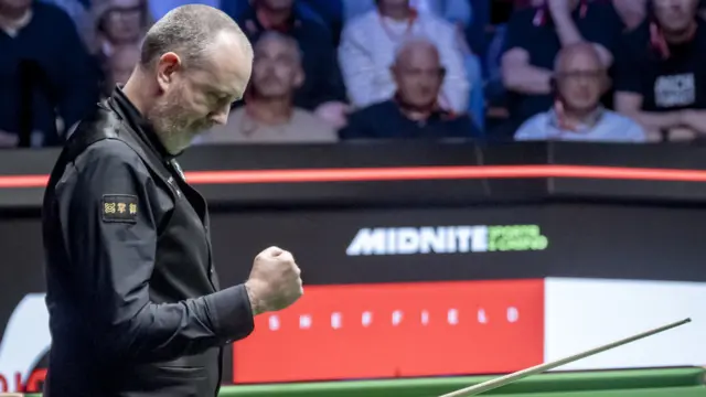 Mark Williams celebrates