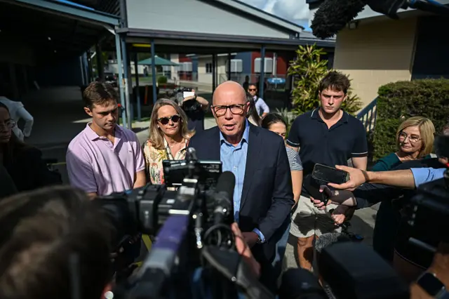 Opposition Leader Peter Dutton speaks to the media after casting his vote at the Albany Creek state school