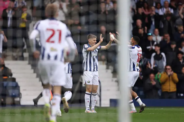 Tom Fellows celebrates scoring for West Brom