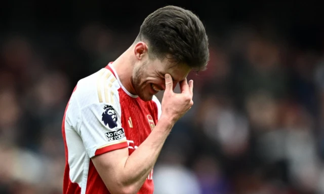 Arsenal's Declan Rice looks down