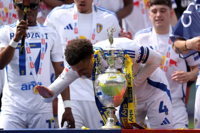 Leeds captain Ethan Ampadu celebrates the title win