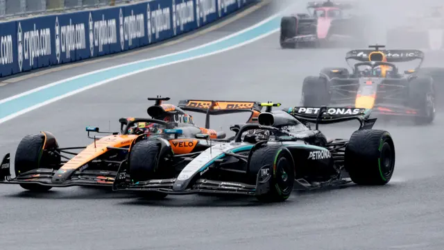 Oscar Piastri and Kimi Antonelli alongside each other going into the first corner of the Miami GP sprint race