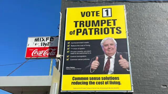 A picture showing a billboard sign reading 'Vote 1 Trump of Patriots'