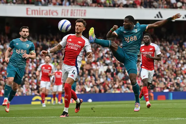 Ben White defends from Bournemouth's Burkinabe striker Dango Ouattara