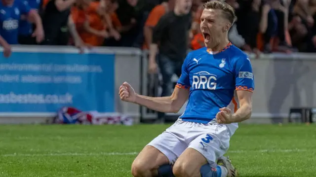 Oldham's Mark Kitching celebrating their second goal against York in the play-offs