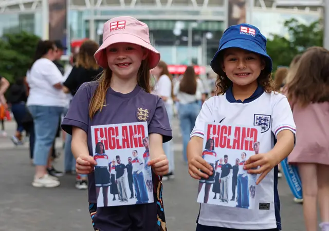 England fans hold up the programme