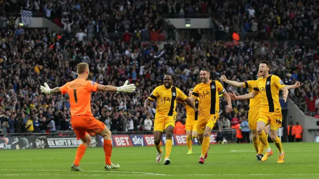 Southend goalkeeper Daniel Bentley celebrating with team-mates at the 2015 play-off final