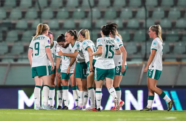 Katie McCabe speaks to team-mates