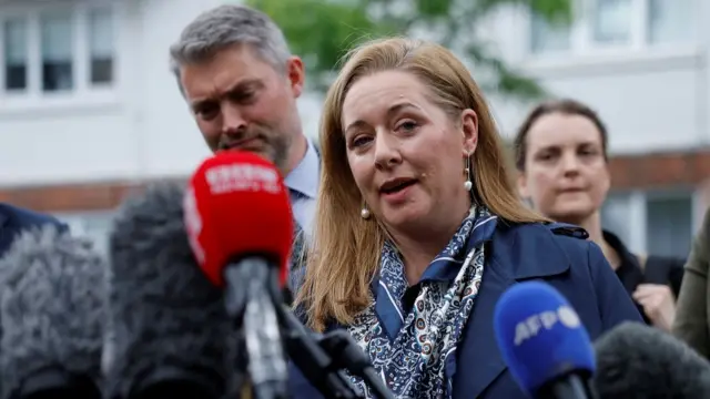 BBC journalist Jennifer O'Leary speaks to media outside