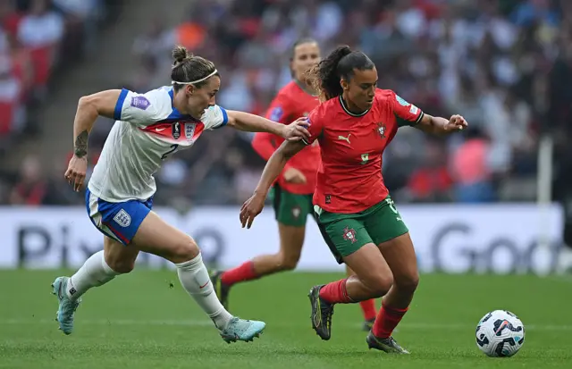 Bronze presses her opponent