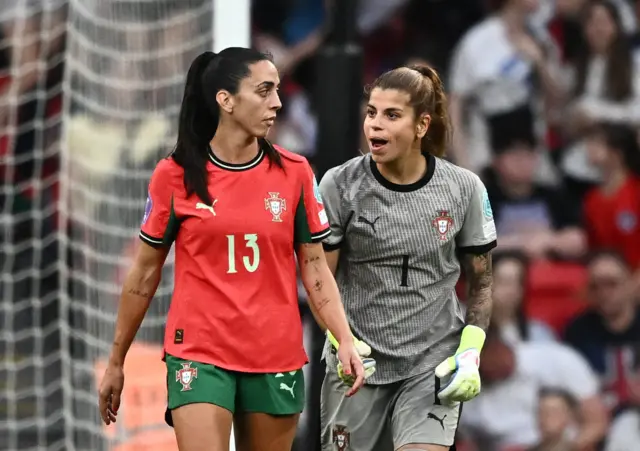 Portugal players argue after conceding another goal