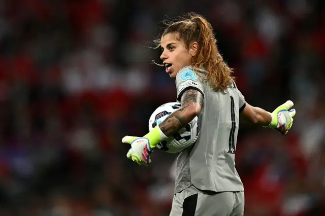 Pereira waves to her defenders