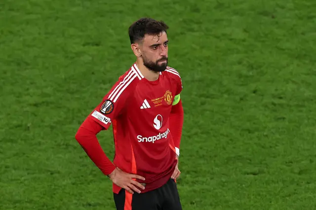 Bruno Fernandes with his hands on his hips