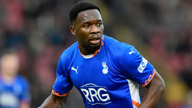 Mike Fondop in action for Oldham