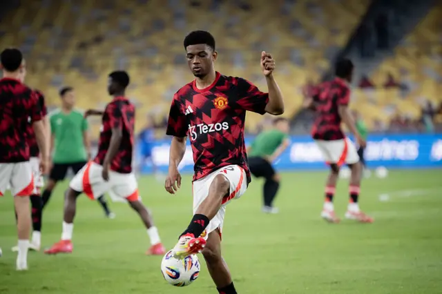 Amad Diallo kicking a ball