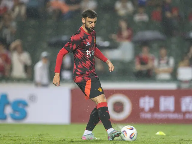Bruno Fernandes kicking a ball