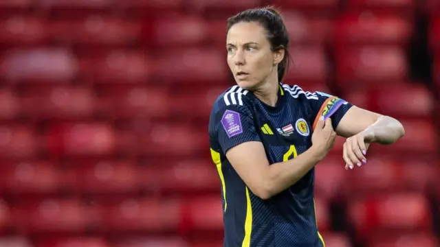 Scotland's Rachel Corsie puts on the captain's armband during a UEFA Women's Nations League A Group 1 match between Scotland and Austria at Hampden Park