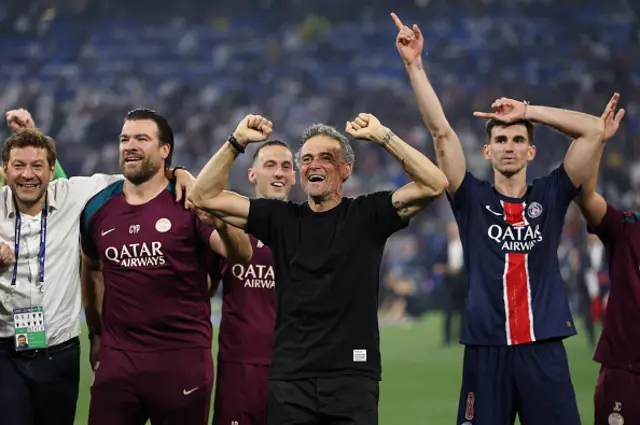 Luis Enrique, Head Coach of Paris Saint-Germain, acknowledges the fans