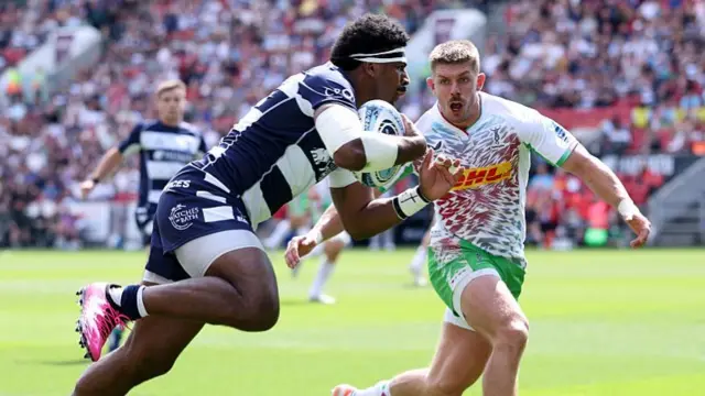 Kalaveti Rovouvou jumps to score a try for Bristol