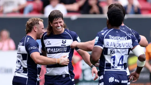 Bristol players celebrate a try