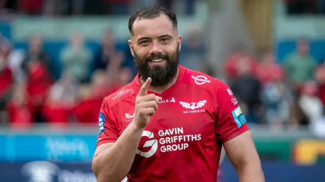 Josh Macleod salutes a victory
