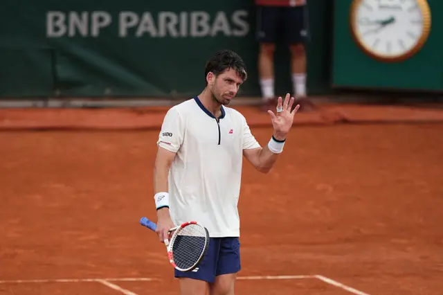 cameron norrie waves to the crowd