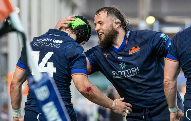 Pierre Schoeman celebrates with Darcy Graham