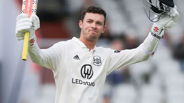Ollie Price celebrates reaching century