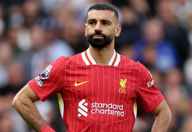 Liverpool's Mohamed Salah reacts
