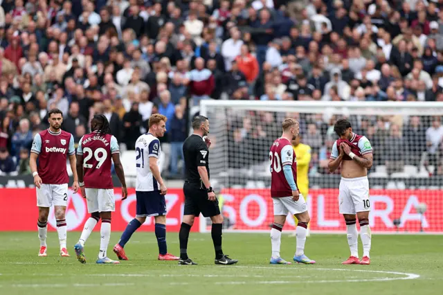 Tottenham and West Ham players react
