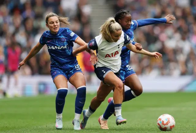 Tottenham Hotspur's Olivia Holdt in action with Chelsea's Johanna Rytting Kaneryd and Oriane Jean-Fran