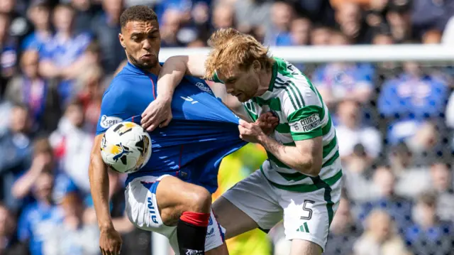 Rangers' Cyriel Dessers and Celtic's Liam Scales
