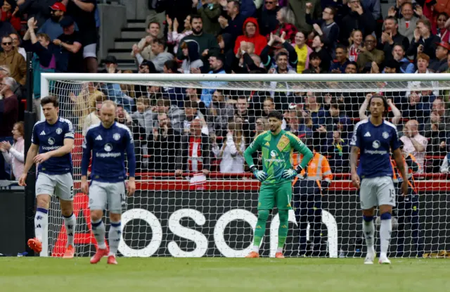 Manchester United players look dejected
