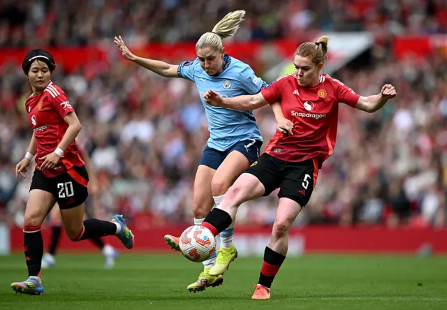 Laura Coombs and Aoife Mannion compete for the ball