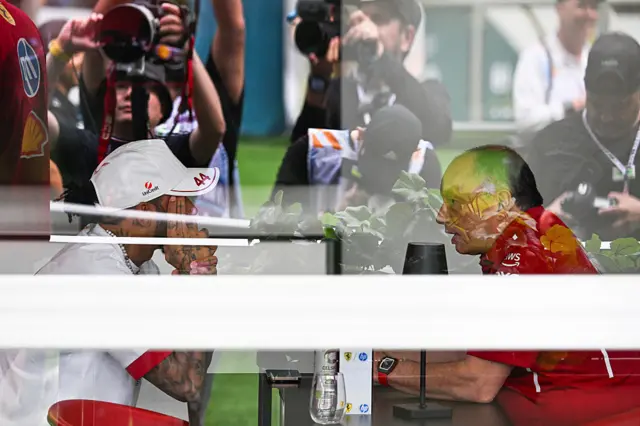 Lewis Hamilton and Fred Vasseur chat in the Miami paddock