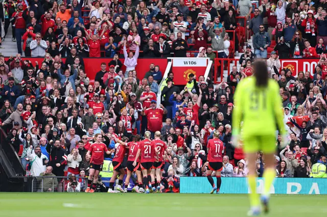 Man United celebrate Melvine Malard's equaliser