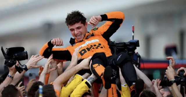 The McLaren team lift Lando Norris up in the air after his Miami win