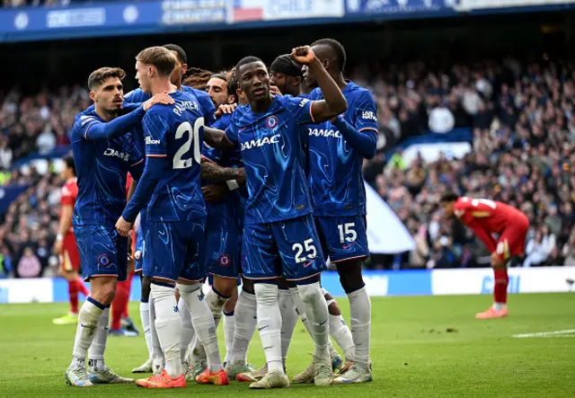 Moises Caicedo and team mates of Chelsea celebrate after Jarell Quansah