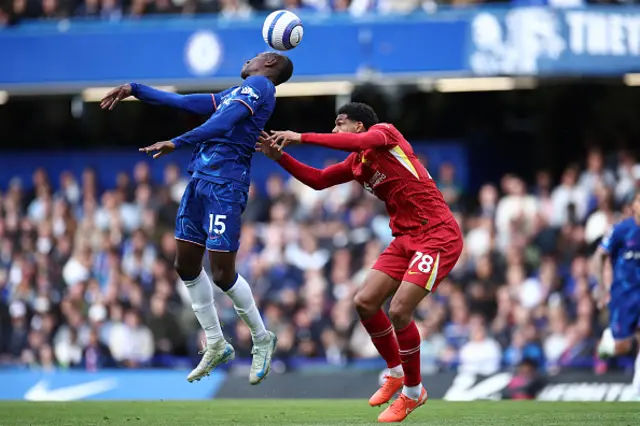 Nicolas Jackson (L) vies with Liverpool's English defender Jarell Quansah