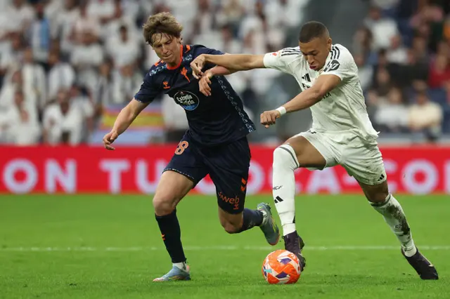 Mbappe goes past an opponent