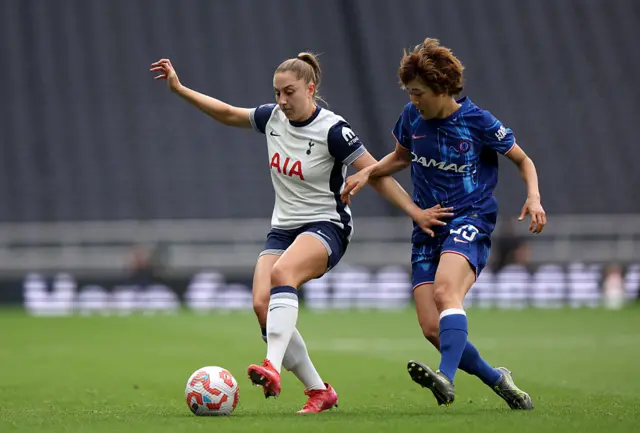 Ella Morris of Tottenham Hotspur is challenged by Maika Hamano of Chelsea during the Barclays Women's Super League match between Tottenham Hotspur and Chelsea at Tottenham Hotspur Stadium on May 04, 2025 in London, England.