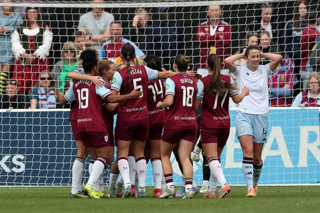 Riko Ueki of West Ham United celebrates scoring her team's second goal with teammates during the Barclays Women's Super League match between West Ham United and Aston Villa at Chigwell Construction Stadium