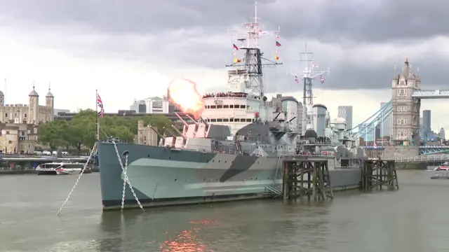 HMS Belfast fires cannons