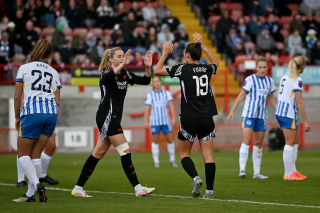 Caitlin Foord of Arsenal celebrates scoring her team's first goal