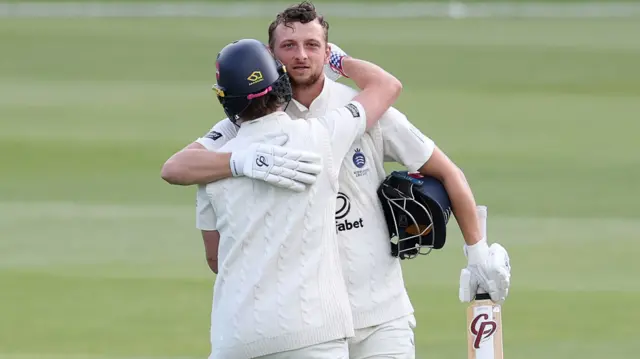 Luke Hollman celebrates century