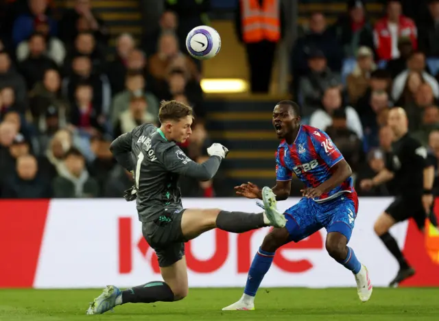 Crystal Palace's Dean Henderson and Crystal Palace's Tyrick Mitchell in action
