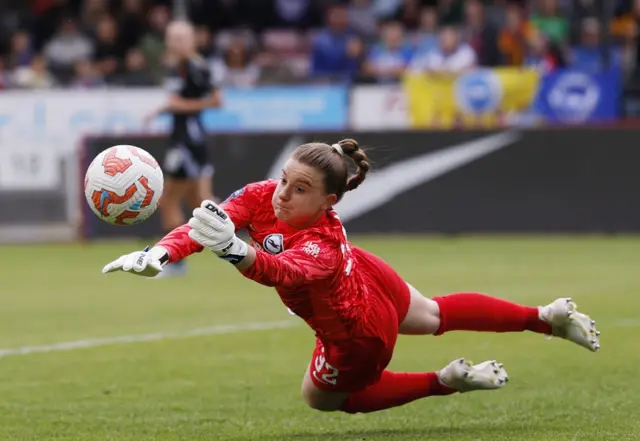 Brighton & Hove Albion's Sophie Baggaley makes a save