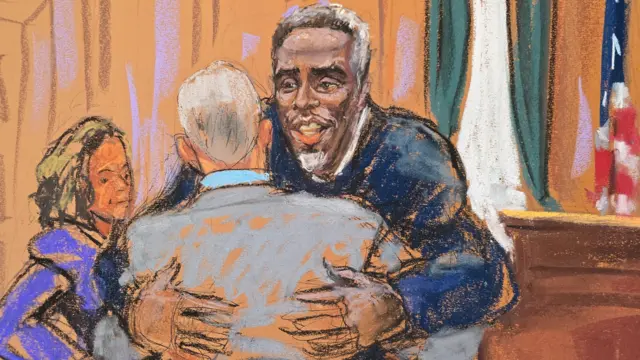 Sean "Diddy" Combs embraces his attorneys before jury questioning got underway in his sex trafficking trial in New York City