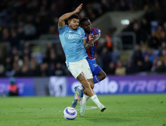 Crystal Palace's Tyrick Mitchell in action with Nottingham Forest's Morgan Gibbs-White
