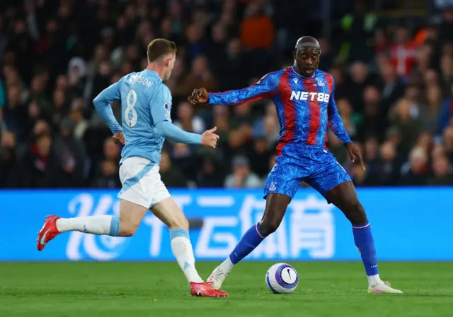 Crystal Palace's Jean-Philippe Mateta in action with Nottingham Forest's Elliot Anderson